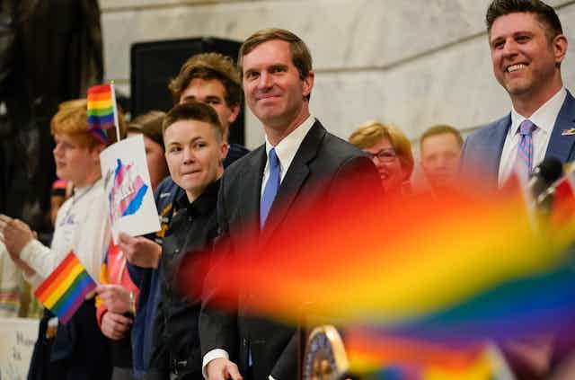Kentucky Democratic Governor Andy Beshear attends a rally held by LGBTQ rights activists.
