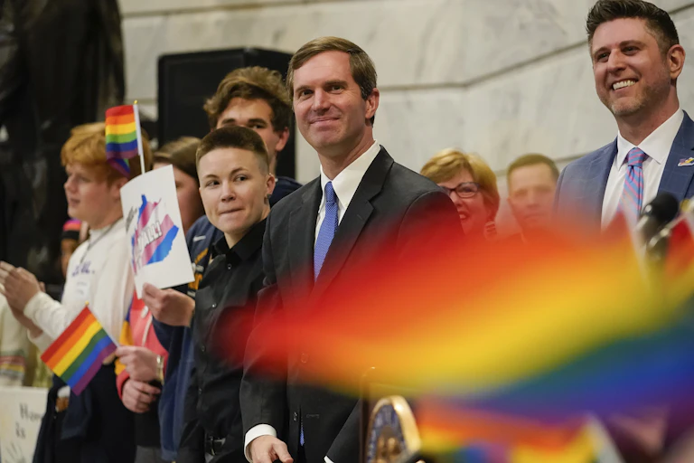 Kentucky Democratic Governor Andy Beshear attends a rally held by LGBTQ rights activists.