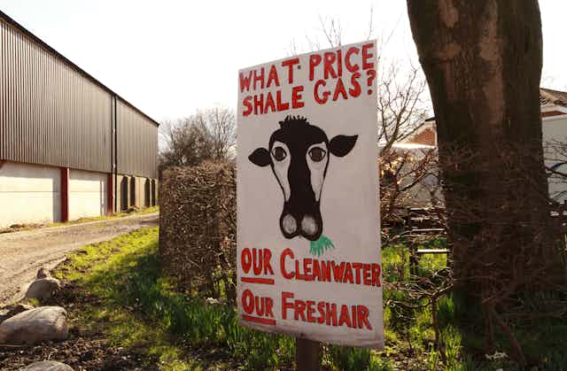 A hand-painted antif-fracking poster at the entrance to a Lancashire farmyard