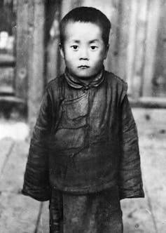 The future Dalai Lama of Tibetan Buddhism, Lhamo Dhondrub, who was later renamed Tenzin Gyatso.