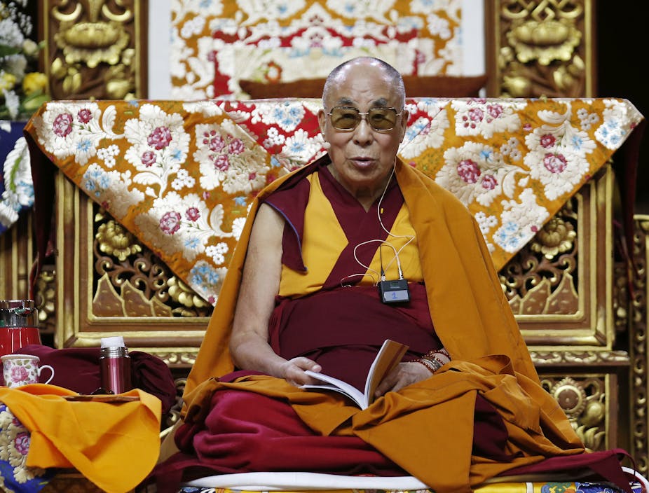 The Dalai Lama Tenzin Gyatso delivers  an address in Milan, Italy, on Oct. 21, 2016. 
