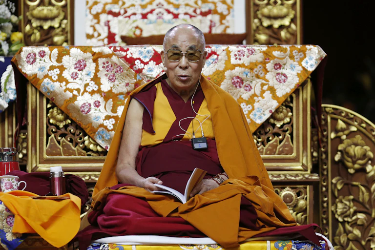 The Dalai Lama Tenzin Gyatso delivers an address in Milan, Italy, on Oct. 21, 2016.