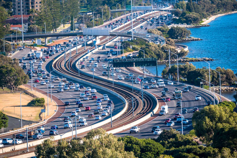 Cars on a highway near water
