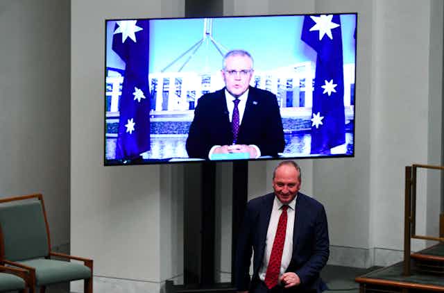Scott Morrison (on a screen) and Barnaby Joyce during question time