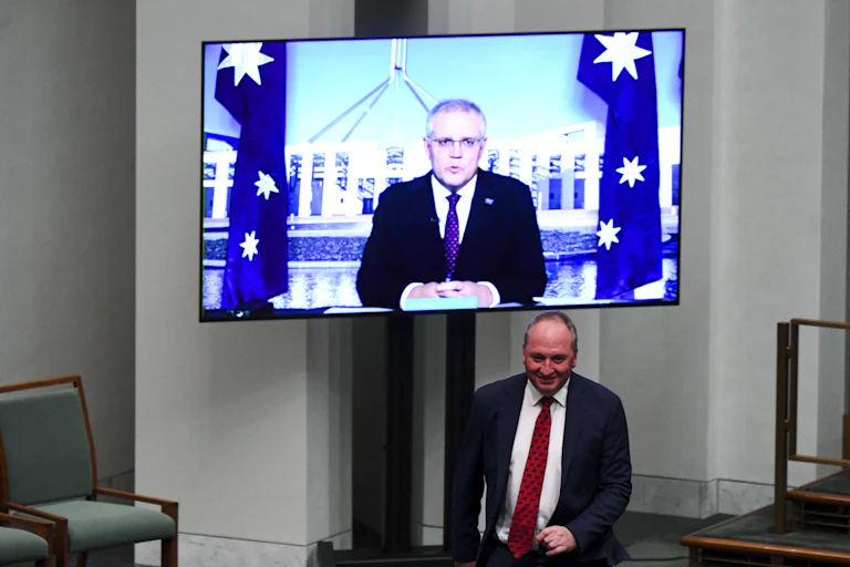 Scott Morrison (on a screen) and Barnaby Joyce during question time