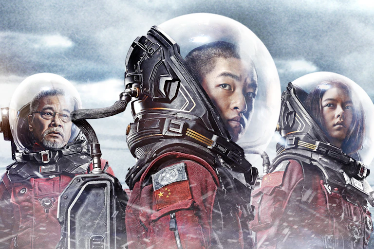 Three astronauts.
