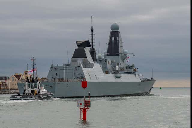 Royal Navy Type 45 destroyer HMS Defender (D36) departing Portsmouth Harbour, UK on October 8 2018