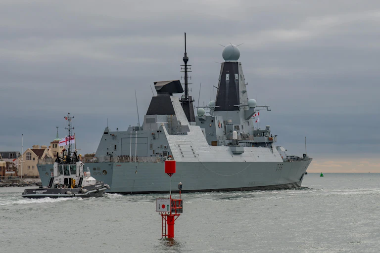 Royal Navy Type 45 destroyer HMS Defender (D36) departing Portsmouth Harbour, UK on October 8 2018