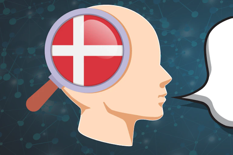 A figure of a human head with a Danish flag on the side and Danish words in a speech bubble.