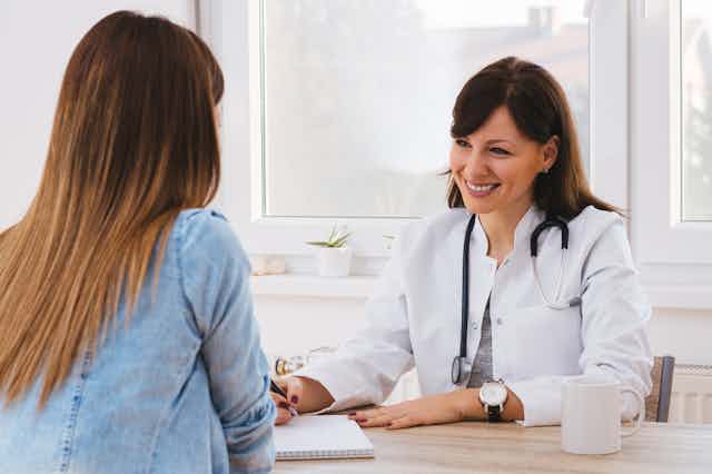 Female patient seeing female doctor 