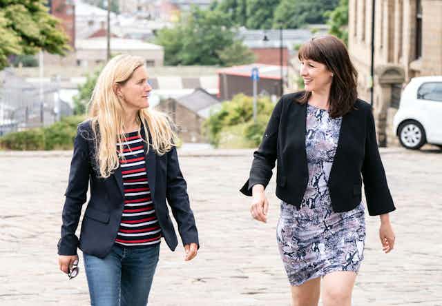 Labour candidate Kim Leadbeater and shadow chancellor Rachel Reeves walking up a hill in the contested seat of Batley in West Yorkshire.