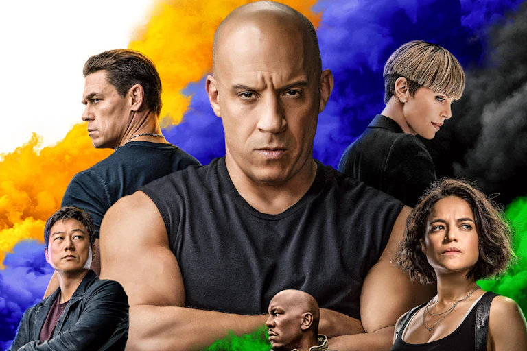 A man in a sleeveless t-shirt with arms folded surrounded by five characters in a circle looking into the distance.