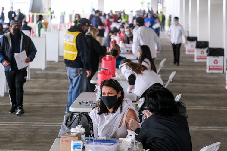People at a vaccination centre in the US