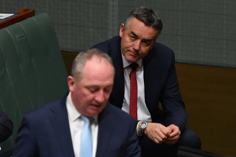 Darren Chester watches Barnaby Joyce during Question Time