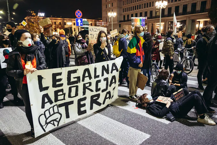 A group of protesters in Warsaw calling for abortion legalisation