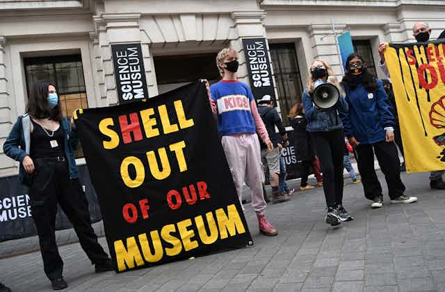 Sign reads: Shell out of our museum