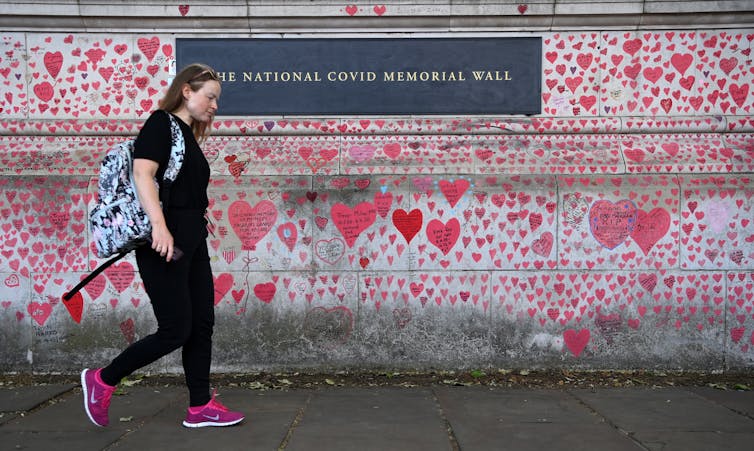 London's COVID-19 Memorial Wall. Britain has recorded more than 128,000 COIVD deaths.