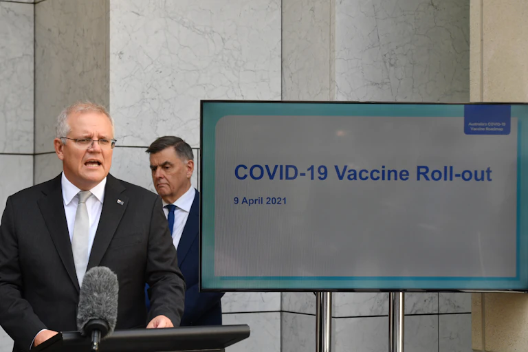 Scott Morrison, with Brendan Murphy in the background