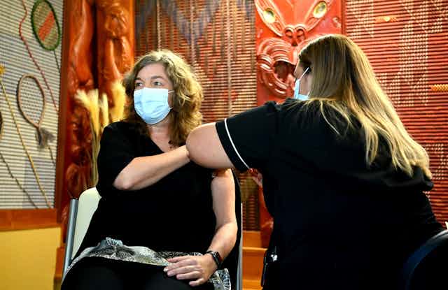 New Zealand's chief science advisor Dame Juliet Gerrard receiving her first vaccination dose.