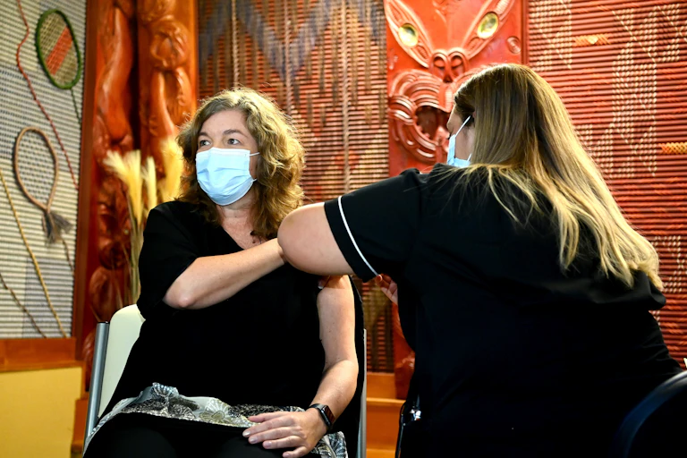 New Zealand's chief science advisor Dame Juliet Gerrard receiving her first vaccination dose.