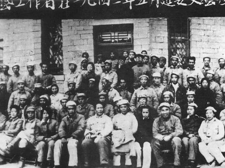 Group picture of Mao Zedong and members of the CHinese COmmunist Party at Yan'an in 1942.