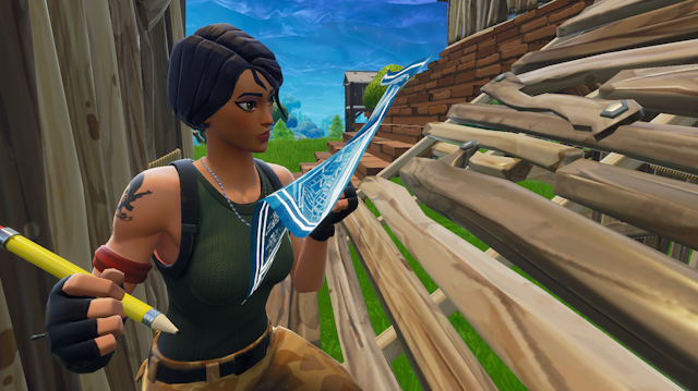 A scene from Fortnite in which a character holds a pencil and blueprints while building