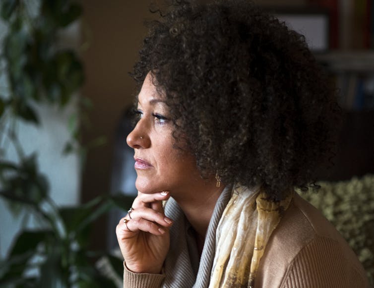 woman with black curly hair