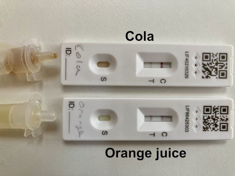 Image of positive tests, using cola and orange juice.
