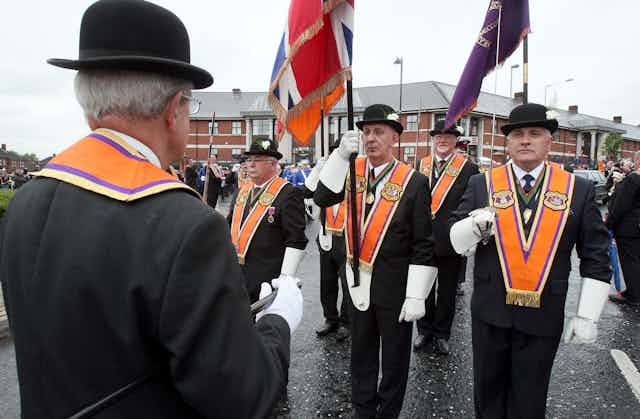 A group of Orangemen gathering in Belfast for a Twelfth of July march.