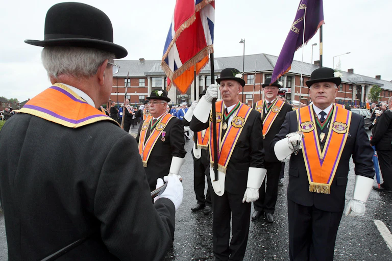 A group of Orangemen gathering in Belfast for a Twelfth of July march.