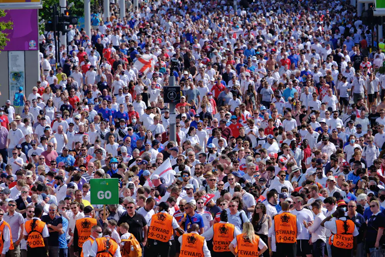 A sea of red and white as 20,500 England and Croatian football fans leave Wembley stadium after a group stage game