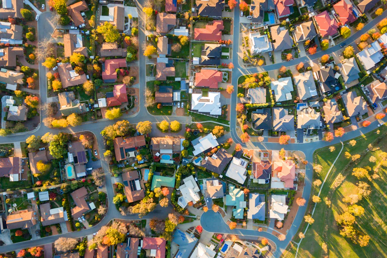 Aerial view of detached suburbian houses.