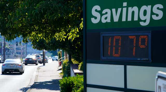 A bank sign displays a temperature of 107 F.