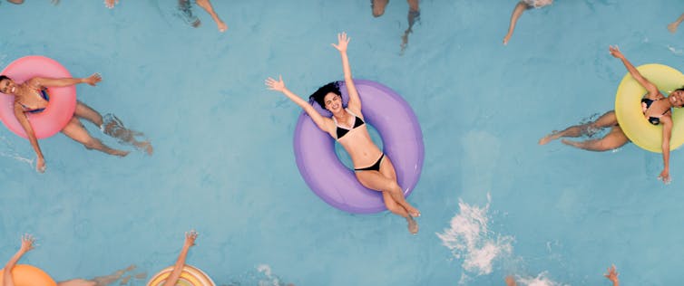 In The Heights production shot above a pool