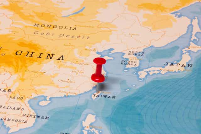 Map of China and Taiwan with red pin in Taiwan.