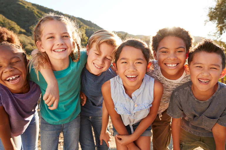 A group of smiling children.