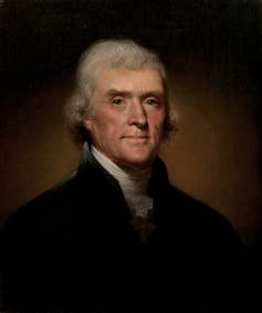 A portrait of Thomas Jefferson in his later years, wearing a black jacket, white shirt and looking dignified, as befits a president.