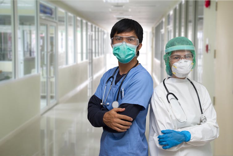 Two medical members of staff wearing PPE