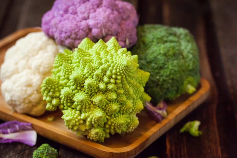 Green, white and purple cauliflowers