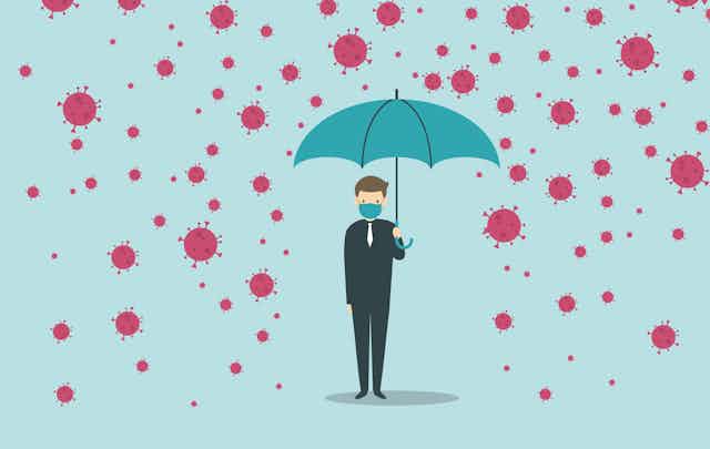 A man holding an ubrella underneath raining coronavirus particles.
