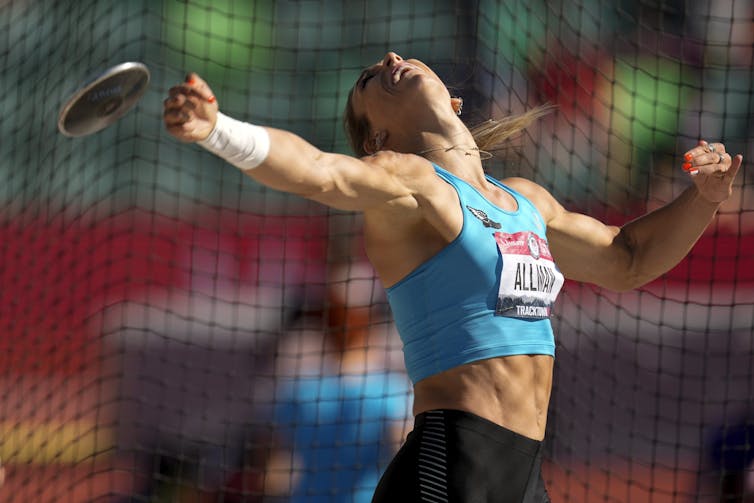 Women throwing a discus