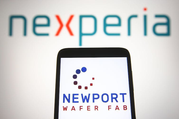 Smartphone with Newport Wafer Fab onscreen with Nexperia logo in background.