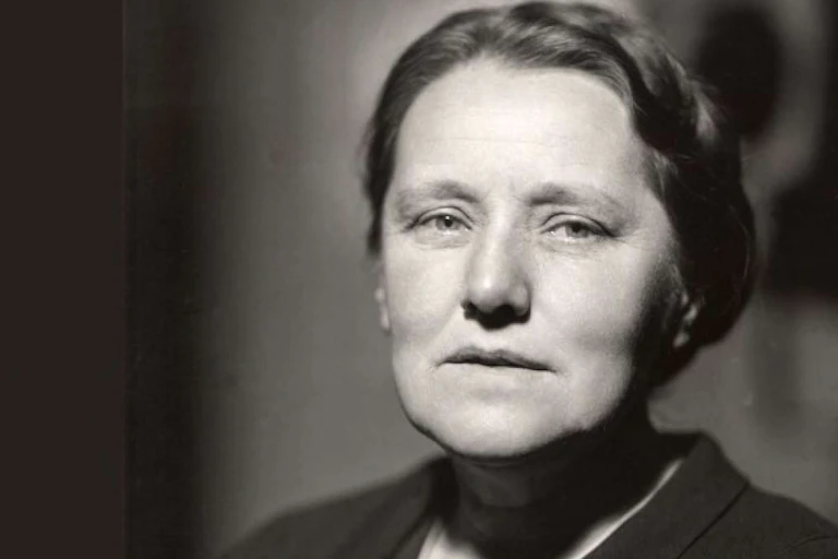 Black and white image of Susan Stebbing looking into the camera