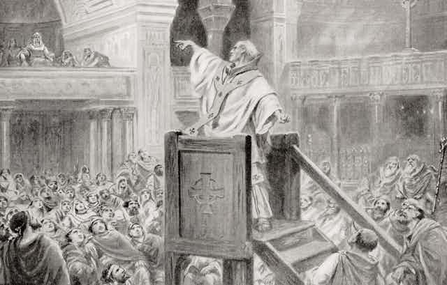 Black and white image of a Christian preacher in a pulpit