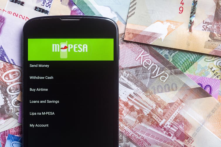 Smartphone using M-Pesa.