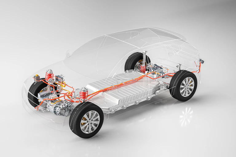 A see-through electric car with battery and cables highlighted.