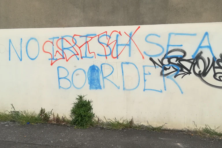 Graffiti protesting the possibility of a border in the Irish Sea on a wall in Belfast.