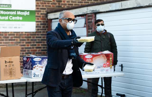 Members of Wapping Mosque distributing food during the pandemic
