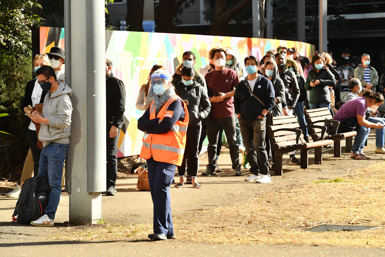 Sydneysiders lining up outside for COVID vaccination