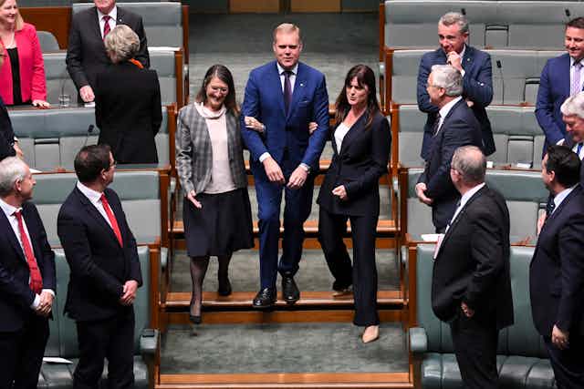 Tony Smith being dragged to the speaker chair in 2019